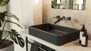 strefa umywalki loft, umywalka o organicznym kształcie, umywalka z czarnego granitu, umywalka z kamienia